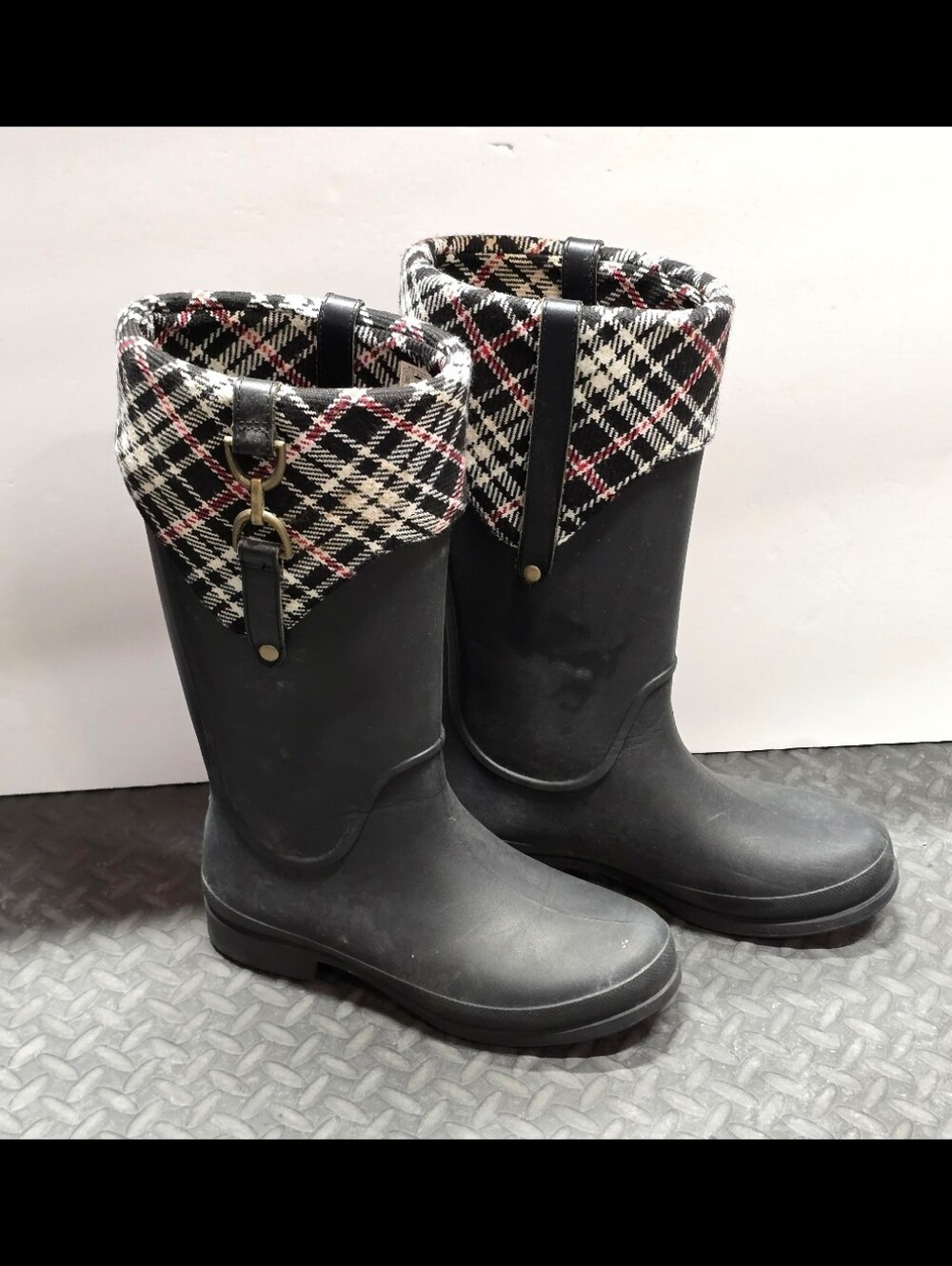 CROCS black knee-high rain boots with plaid cuffs